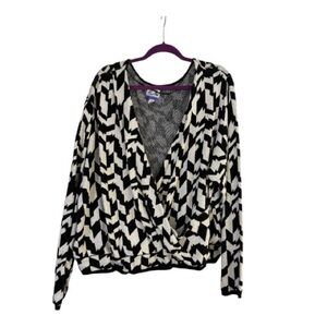 Chic Black and White Sweater by Future Collective